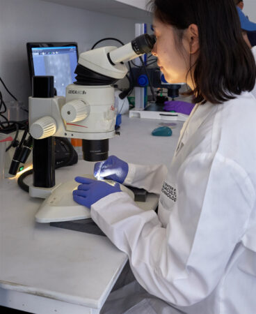 woman at microscope